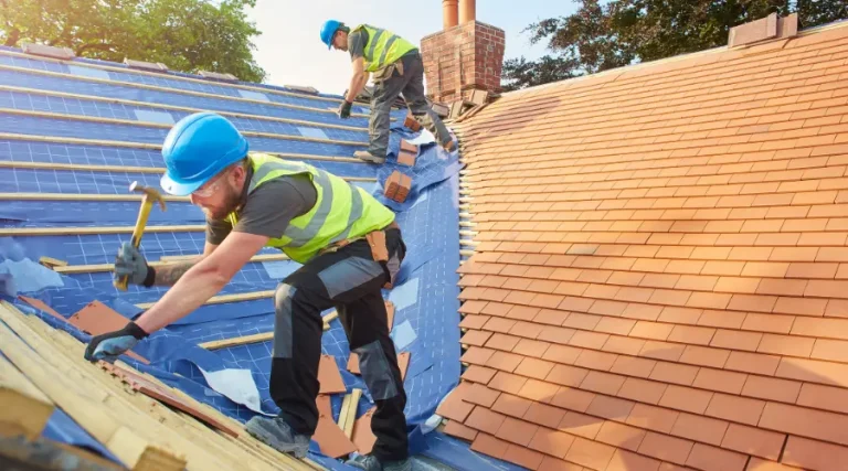 the two man working together at the roof