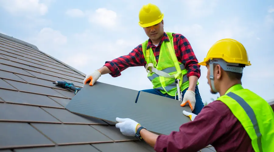 man fixing the roof